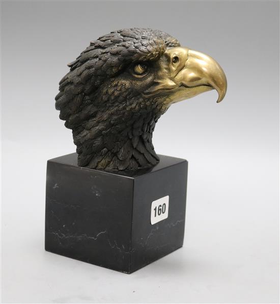 Milo. A bronze eagle head, on marble base, height 21.5cm